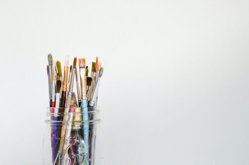Paint brushes in a jar.